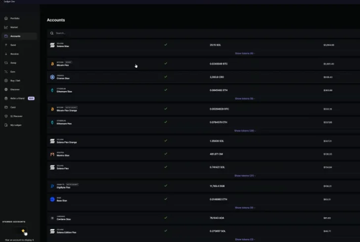 Ledger Live software showing a list of various crypto accounts, including Ethereum and Bitcoin wallets.