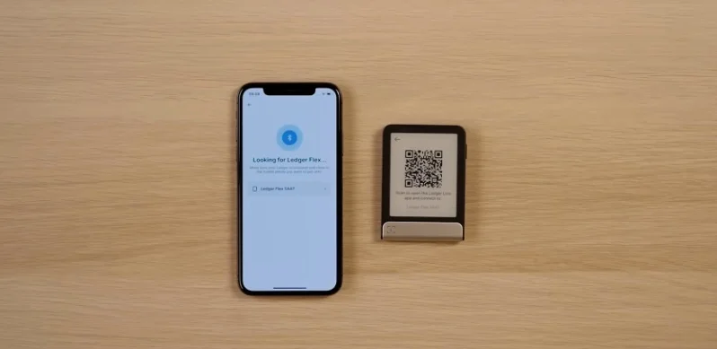 Ledger Flex device screen displaying a QR code with 'Tap to continue' instructions