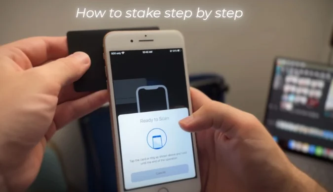 Tapping the Tangem card to confirm staking transaction.