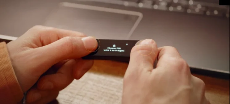 Ledger Nano X screen displaying 'Restore from Recovery phrase' option.